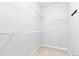 Walk-in closet with wire shelving; providing ample storage at 22580 E Ontario Dr # 103, Aurora, CO 80016