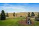 Backyard with playground, trampoline, and open space at 5861 E Valley Hi Dr, Parker, CO 80138