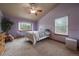 Bright bedroom with vaulted ceiling, window, and neutral decor at 5861 E Valley Hi Dr, Parker, CO 80138