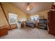 Bedroom with window, desk, chair, and a fish tank at 5861 E Valley Hi Dr, Parker, CO 80138