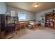 bedroom with a desk, bookshelf, and window at 5861 E Valley Hi Dr, Parker, CO 80138