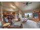 Open concept living room with views and access to kitchen and deck at 5861 E Valley Hi Dr, Parker, CO 80138