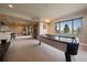 Finished basement with a game table and plenty of space at 5861 E Valley Hi Dr, Parker, CO 80138