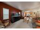 Spacious living room with a large aquarium and comfy seating at 5861 E Valley Hi Dr, Parker, CO 80138