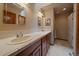 Bathroom with double vanity and a shower at 5861 E Valley Hi Dr, Parker, CO 80138