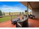 Spacious deck with seating area and tranquil views at 5861 E Valley Hi Dr, Parker, CO 80138