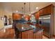 Modern kitchen with granite countertops and stainless steel appliances at 5861 E Valley Hi Dr, Parker, CO 80138
