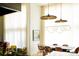 Bright dining room featuring a dark wood table and stylish chairs at 2556 18Th St, Denver, CO 80211