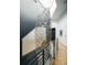Modern open staircase with a unique metal sculpture at 2556 18Th St, Denver, CO 80211