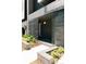 Modern building exterior with brick accents and landscaped grounds at 2556 18Th St, Denver, CO 80211