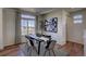 Bright dining area with modern table and chairs at 1230 Sugarloaf Ln, Erie, CO 80516