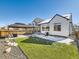 Artificial turf backyard with pergola and patio at 16487 E 111Th Pl, Commerce City, CO 80022