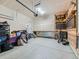 Garage with built-in shelving and extra storage at 16487 E 111Th Pl, Commerce City, CO 80022