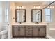 Elegant double vanity bathroom with a walk-in shower at 6666 Bridle Creek Pt, Castle Pines, CO 80108
