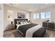 Spacious bedroom with a king-size bed and plenty of light at 6664 Bridle Creek Pt, Castle Pines, CO 80108
