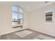 Spacious bedroom featuring a vaulted ceiling and multiple windows at 6664 Bridle Creek Pt, Castle Pines, CO 80108