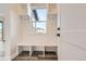 Clean entryway with built-in bench and storage at 6664 Bridle Creek Pt, Castle Pines, CO 80108