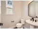 Modern powder room with updated sink and vanity at 6664 Bridle Creek Pt, Castle Pines, CO 80108