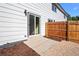 Small back patio with sliding glass door access at 8449 W Dakota Ave # B, Lakewood, CO 80226