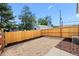 Landscaped backyard with gravel and wood fence at 8449 W Dakota Ave # B, Lakewood, CO 80226