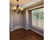 Bright dining room with hardwood floors and chandelier at 2855 Rock Creek Cir # 158, Superior, CO 80027