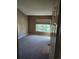 Bedroom with window and adjacent bathroom at 2855 Rock Creek Cir # 158, Superior, CO 80027