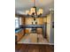 Kitchen with light wood cabinets, granite island, and stainless steel appliances at 2855 Rock Creek Cir # 158, Superior, CO 80027