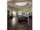 Lobby with a high ceiling, comfortable seating, and wood-like flooring at 2855 Rock Creek Cir # 158, Superior, CO 80027
