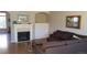 Comfortable living room with fireplace and hardwood floors at 2855 Rock Creek Cir # 158, Superior, CO 80027