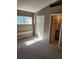 Bedroom with window seat and bathroom access at 2855 Rock Creek Cir # 158, Superior, CO 80027