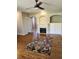 Bright living room with hardwood floors and a fireplace at 2855 Rock Creek Cir # 158, Superior, CO 80027