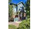 Exterior view of a two-story home with a brick and teal facade at 2855 Rock Creek Cir # 158, Superior, CO 80027