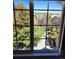 View from window showing trees and parking lot at 2855 Rock Creek Cir # 158, Superior, CO 80027
