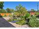 Relaxing backyard pond with water lilies and stone patio at 1843 Spruce St, Boulder, CO 80302
