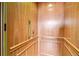Image of an elegant wooden elevator interior, showcasing a clean and well-maintained design at 1843 Spruce St, Boulder, CO 80302