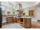 Rustic kitchen with unique cabinetry and large island at 1843 Spruce St, Boulder, CO 80302
