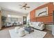 Cozy living room with exposed brick wall and comfortable seating at 1843 Spruce St, Boulder, CO 80302