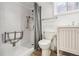 Basement bathroom with walk-in shower, toilet, and vanity at 1843 Spruce St, Boulder, CO 80302