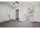Upper-level bedroom with a private bath, walk-in closet, and access to an upper hallway at 1843 Spruce St, Boulder, CO 80302