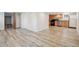 Finished basement with open layout, kitchenette and wood-look flooring at 1843 Spruce St, Boulder, CO 80302