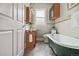 Classic bathroom with clawfoot tub and wood vanity at 1843 Spruce St, Boulder, CO 80302