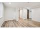 Spacious finished basement with vinyl flooring and access to other rooms at 1843 Spruce St, Boulder, CO 80302