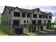 Modern three-story townhome with attached garage at 3833 Whispering Sage St, Evergreen, CO 80439