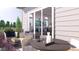 Private patio with outdoor furniture and views of the surrounding area at 3833 Whispering Sage St, Evergreen, CO 80439
