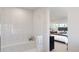 Clean bathroom with a walk-in shower and built-in bench at 3833 Whispering Sage St, Evergreen, CO 80439
