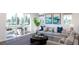 Comfortable living room with sliding doors leading to a patio at 3833 Whispering Sage St, Evergreen, CO 80439