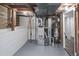 Basement with furnace and hot water heater at 204 S 5Th Ave, Brighton, CO 80601