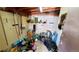 Unfinished basement storage area with shelving at 7071 Zuni St, Denver, CO 80221