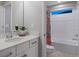 Clean bathroom with a bathtub and shower combination at 23890 E Minnow Dr, Aurora, CO 80016