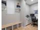 Functional home office with built-in bench, desk, and window at 23890 E Minnow Dr, Aurora, CO 80016